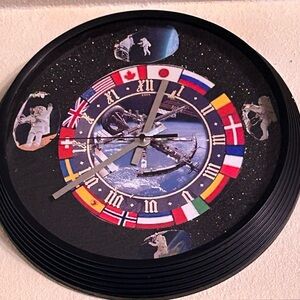 Space & Flags Wall Clock in Black with Multicolor Flag Accents